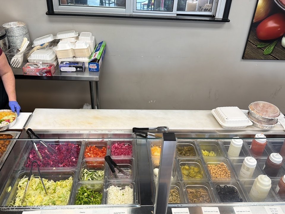Gyro plates served beside crisp golden fries